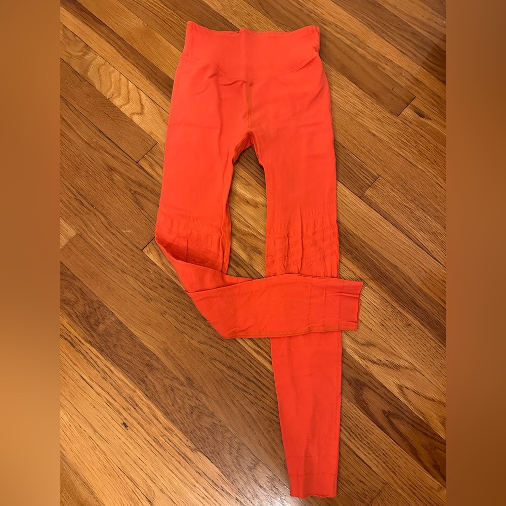 Free people movement size medium orange leggings